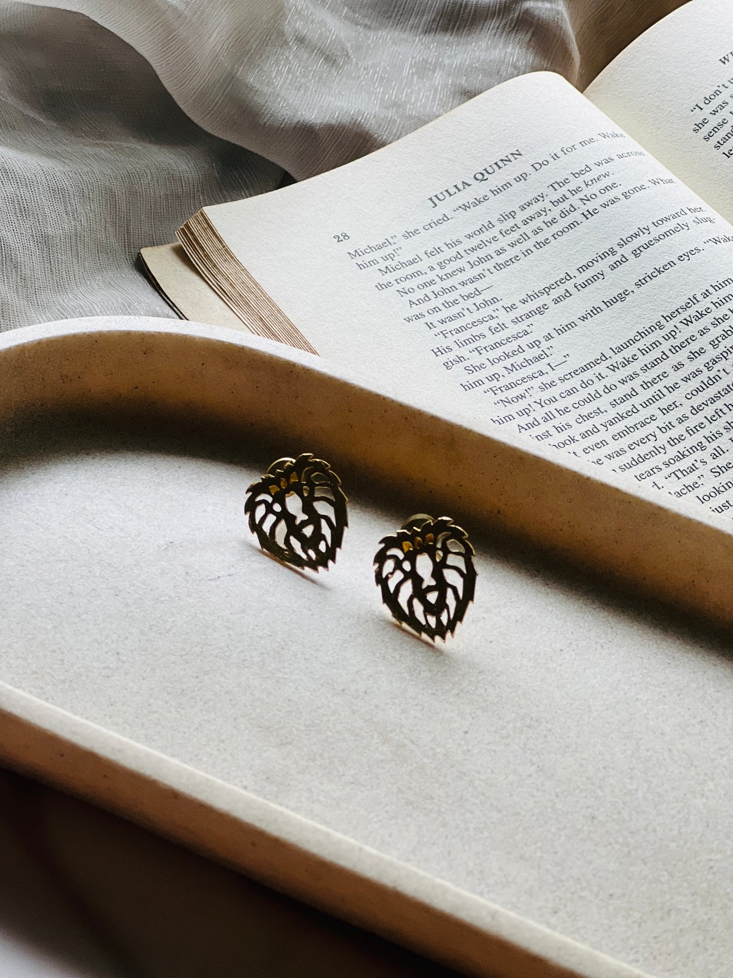 Regal Roar Studs