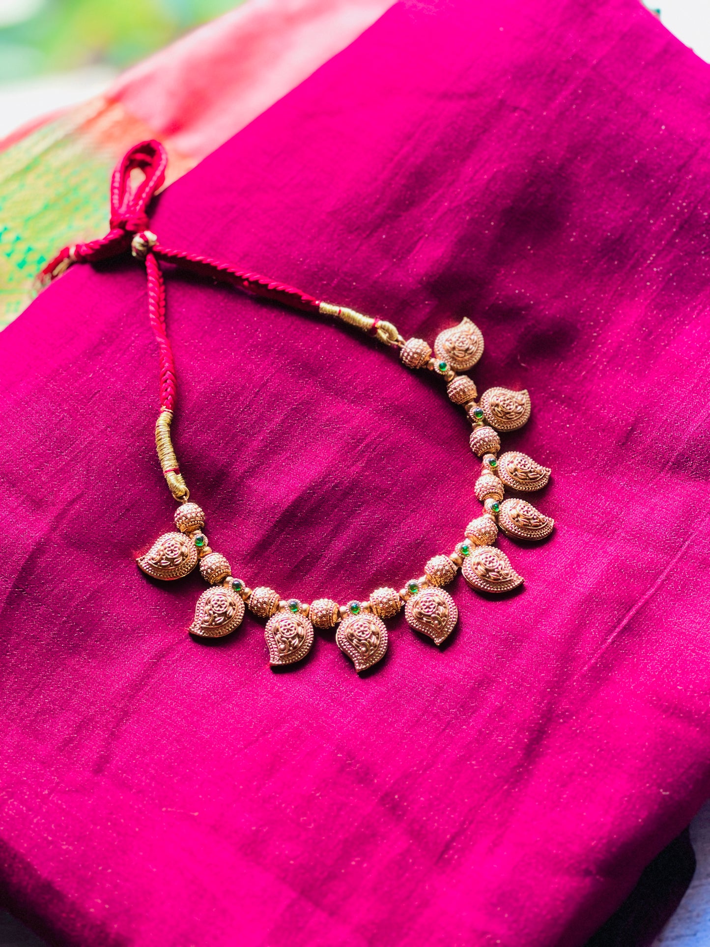Manjadi Thali Mala
