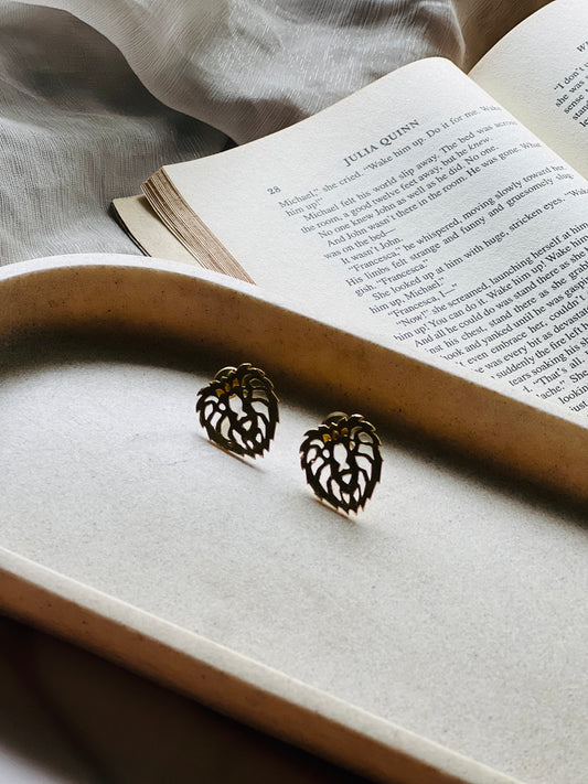 Regal Roar Studs